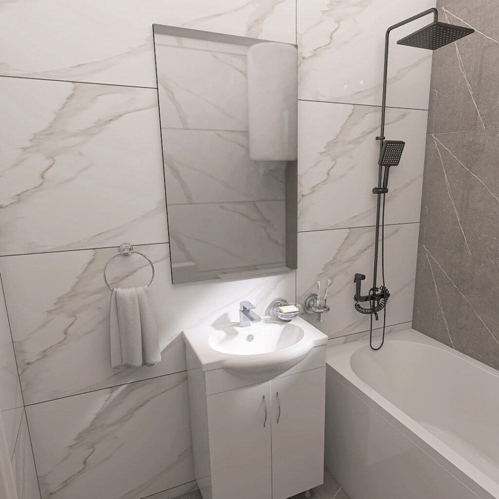 Modern bathroom with white marble tiles, wall-mounted mirror, and a small vanity sink with cabinet beneath; towel ring with a white towel to the left.