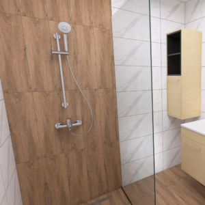 Modern walk-in shower with wood-look wall tiles, a chrome handheld shower, and a clear glass partition beside white marble tiles and a wooden vanity cabinet in a contemporary bathroom.